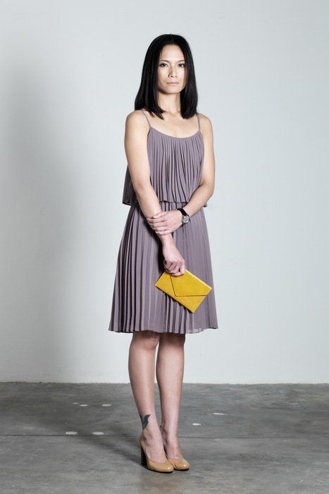 Pleated dress with 1970s Shanghai watch and Heirloom leather document holder in Mustard