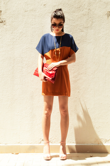 Pantone Dress and a chili red Marie Turnor clutch. Model also threw on a pair of Quay eyewear! 