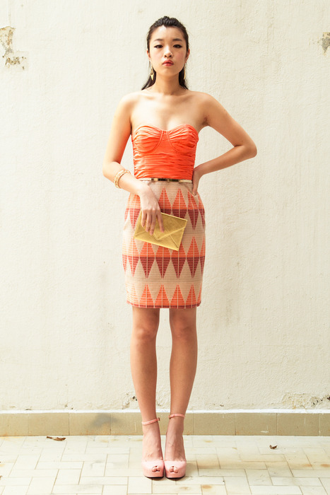 Aijek Pentip bustier dress with a gold Heirloom envelope clutch and tonnes of gold accessories from Edge of Ember.